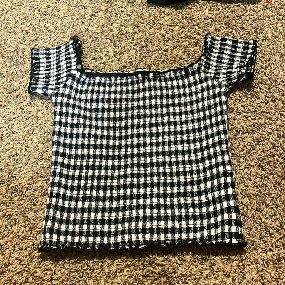 Off the shoulder crop top, it’s a size small and has not been worn before.